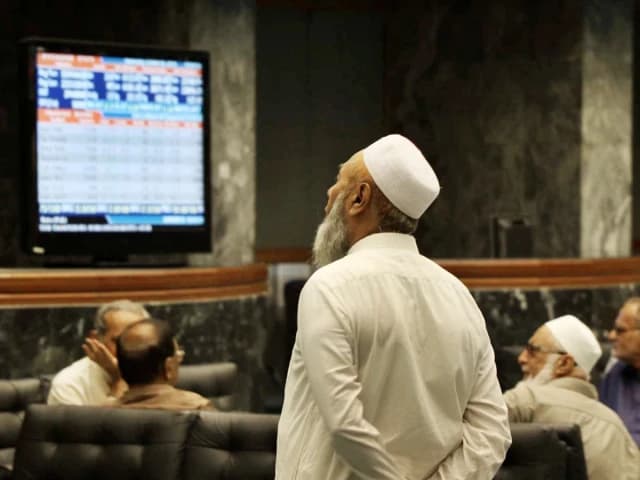 PSX up 446 points at midday