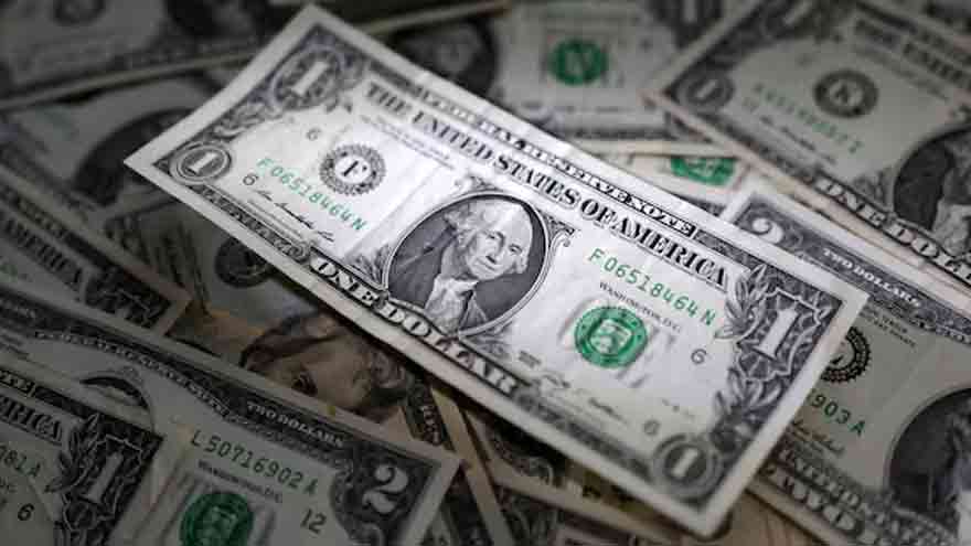 Dollar moves in a narrow range ahead of inflation data