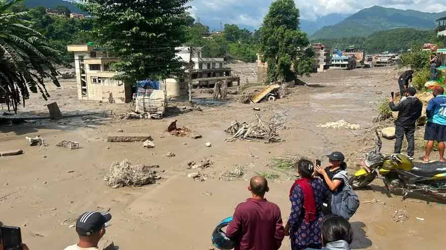 Massive flood near Tibet border kills at least 95 in Nepal: police